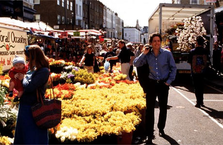 Hugh Grant down the market, in Notting Hill